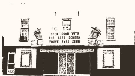 The Cinema Capri in 1976 with palm trees on the marquee